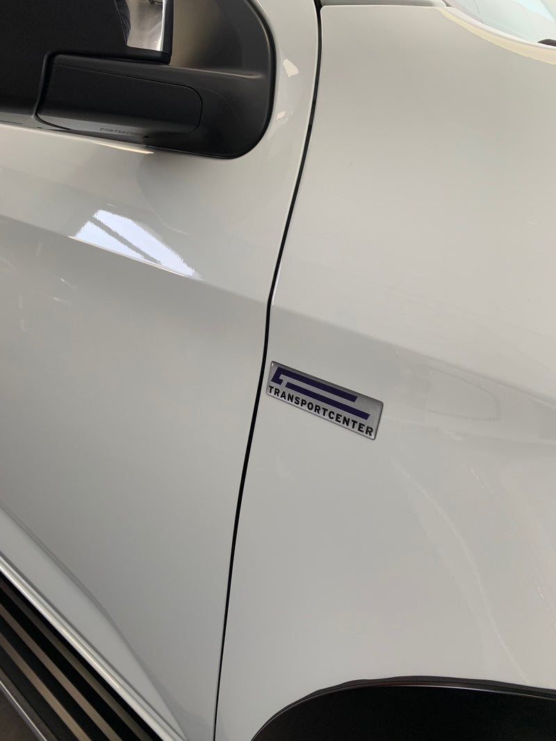 Transportcenter fordon med domedekaler